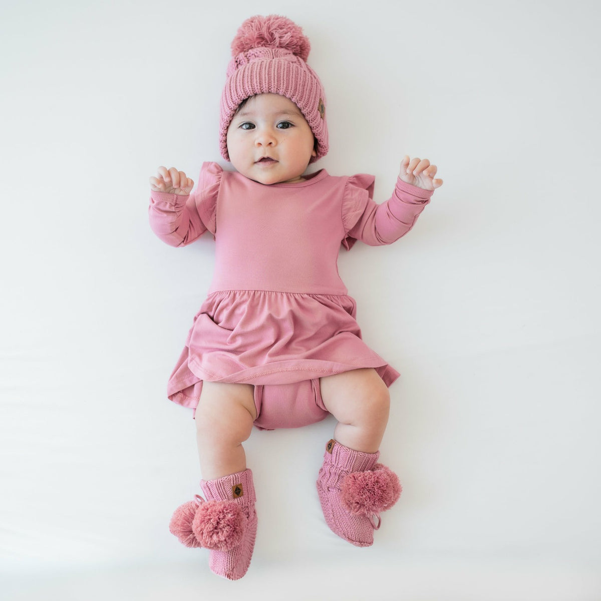 Kyte Baby Knit Booties in Apple Blossom