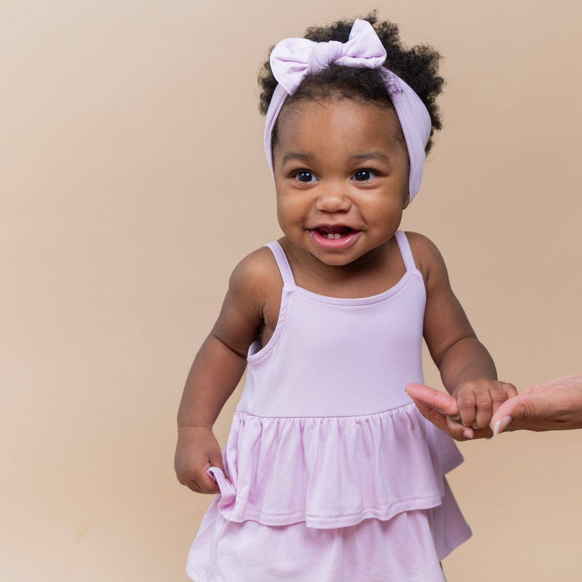 Kyte Baby Spaghetti Strap Ruffle Romper in Thistle