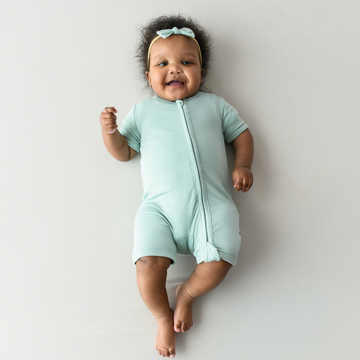 Kyte Baby Zippered Shortall Romper Sage