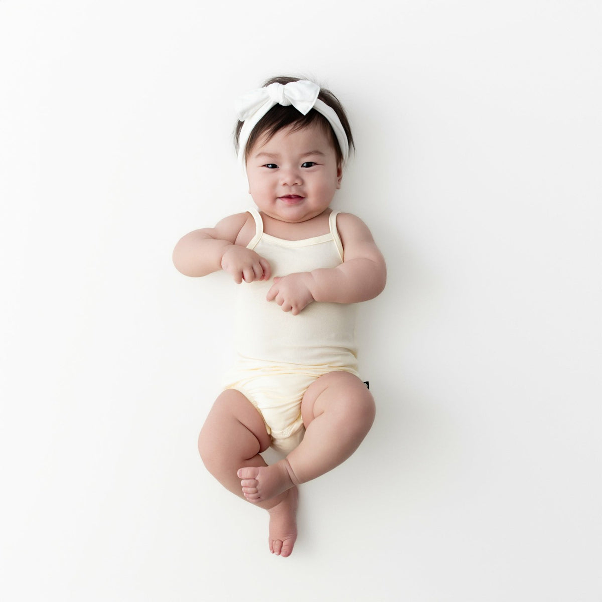 Kyte Baby Spaghetti Strap Leotard in Chamomile