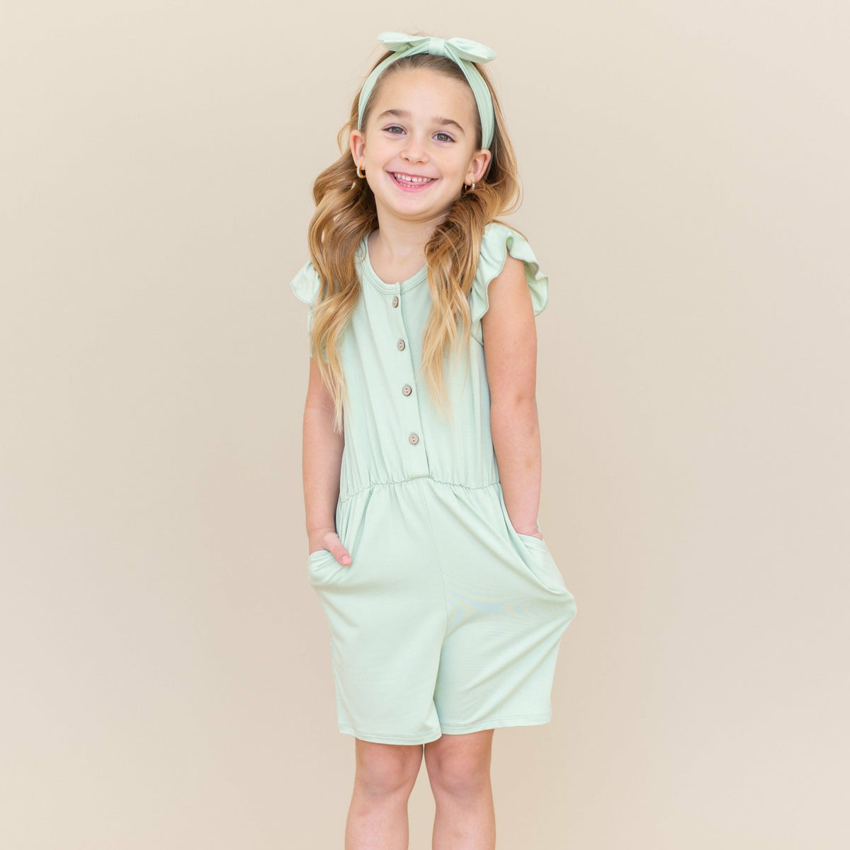 Kyte Baby Flutter Sleeve Romper in Basil