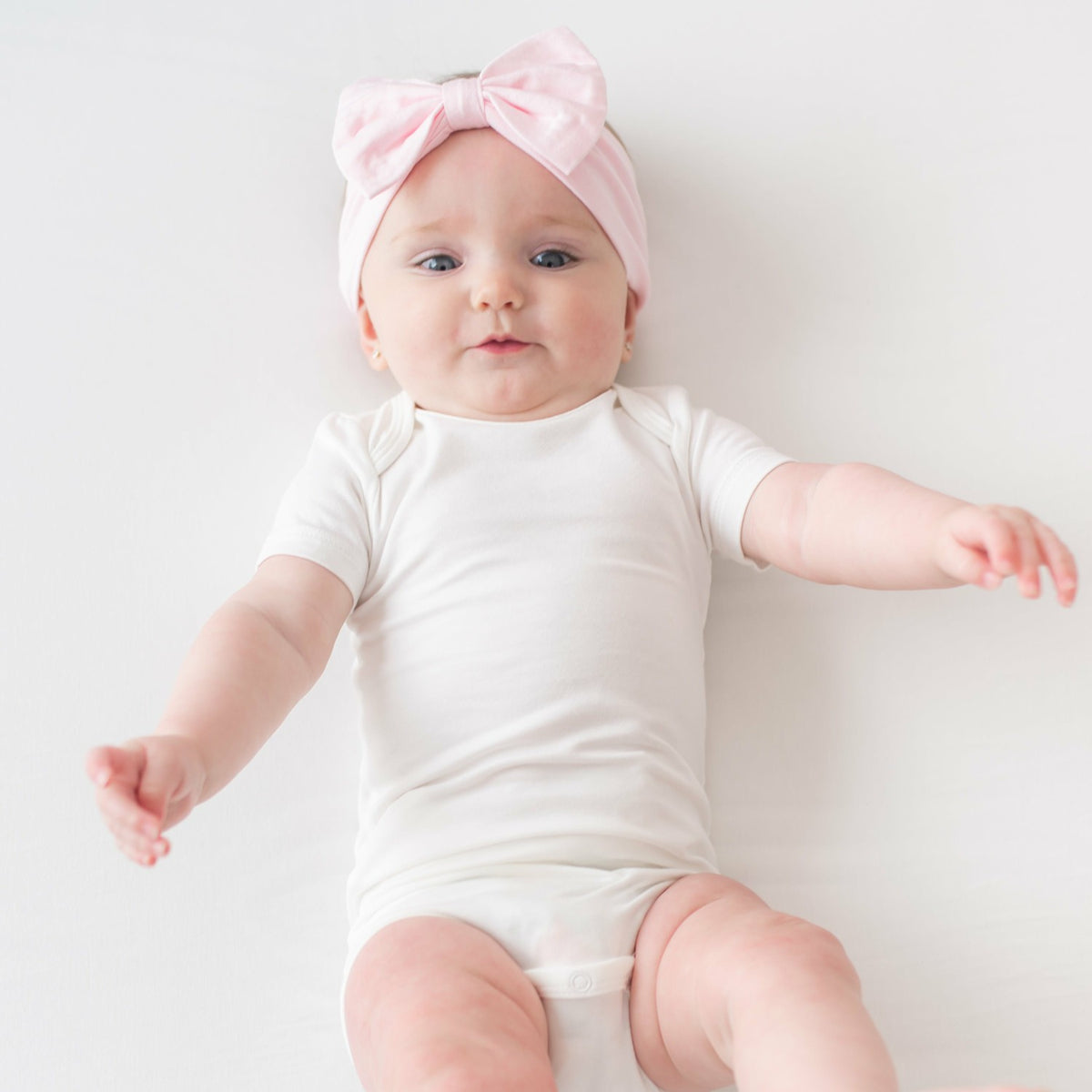 Kyte Baby Bow Headband in Sakura