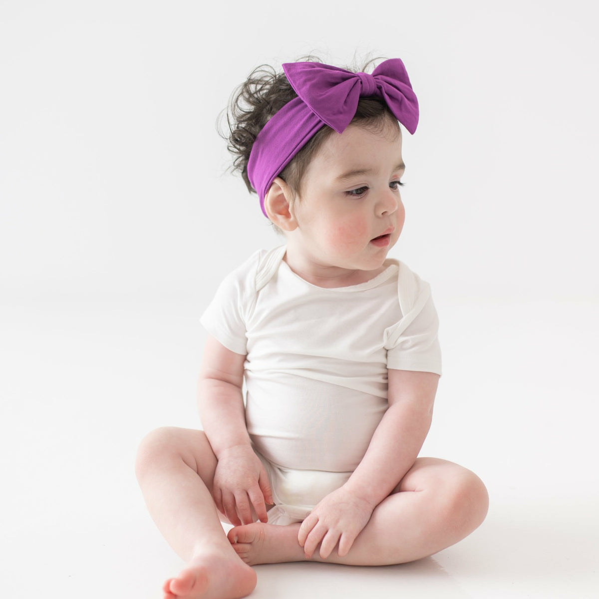 Kyte Baby Bow Headband in Berry