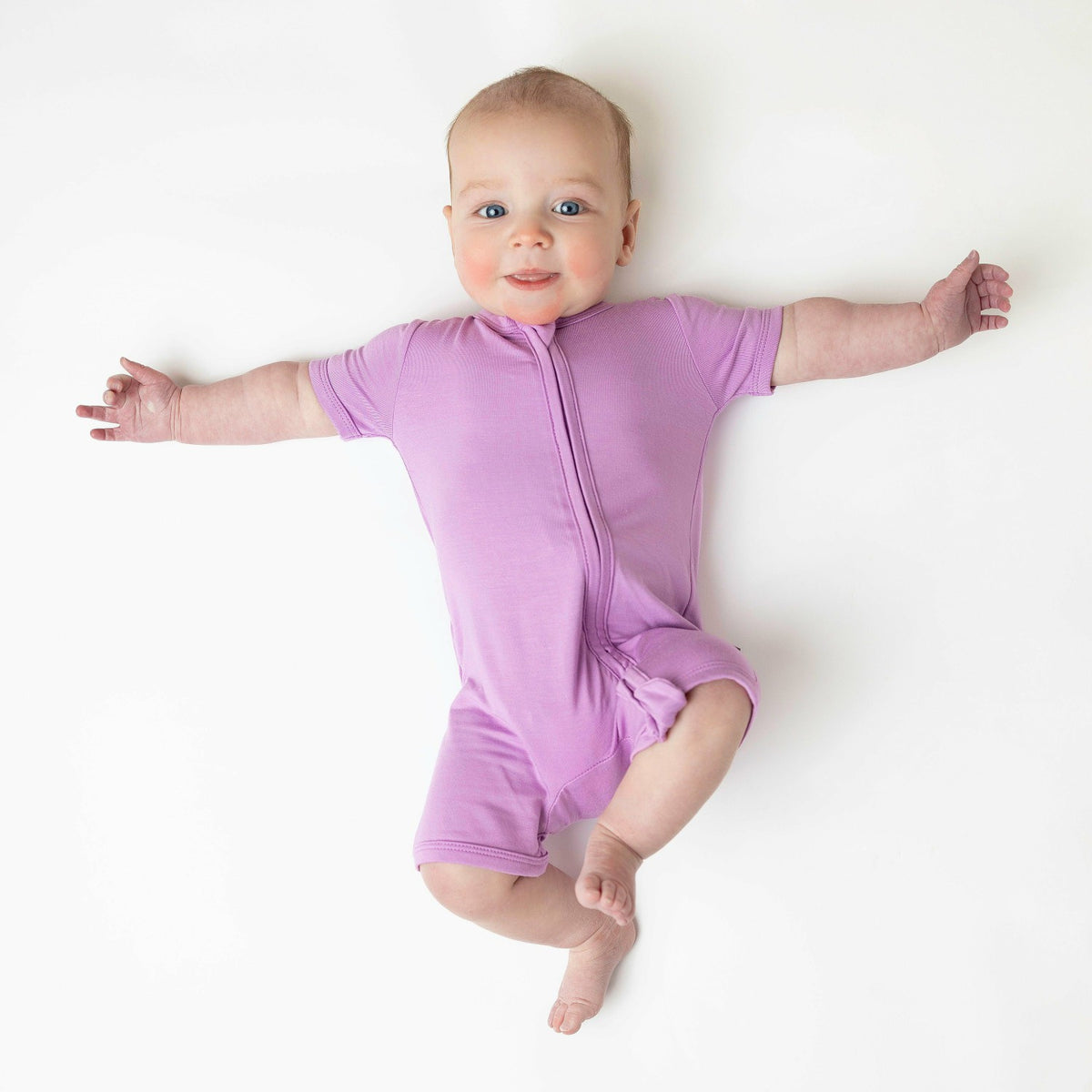 Kyte Baby Zippered Shortall Romper in Poi