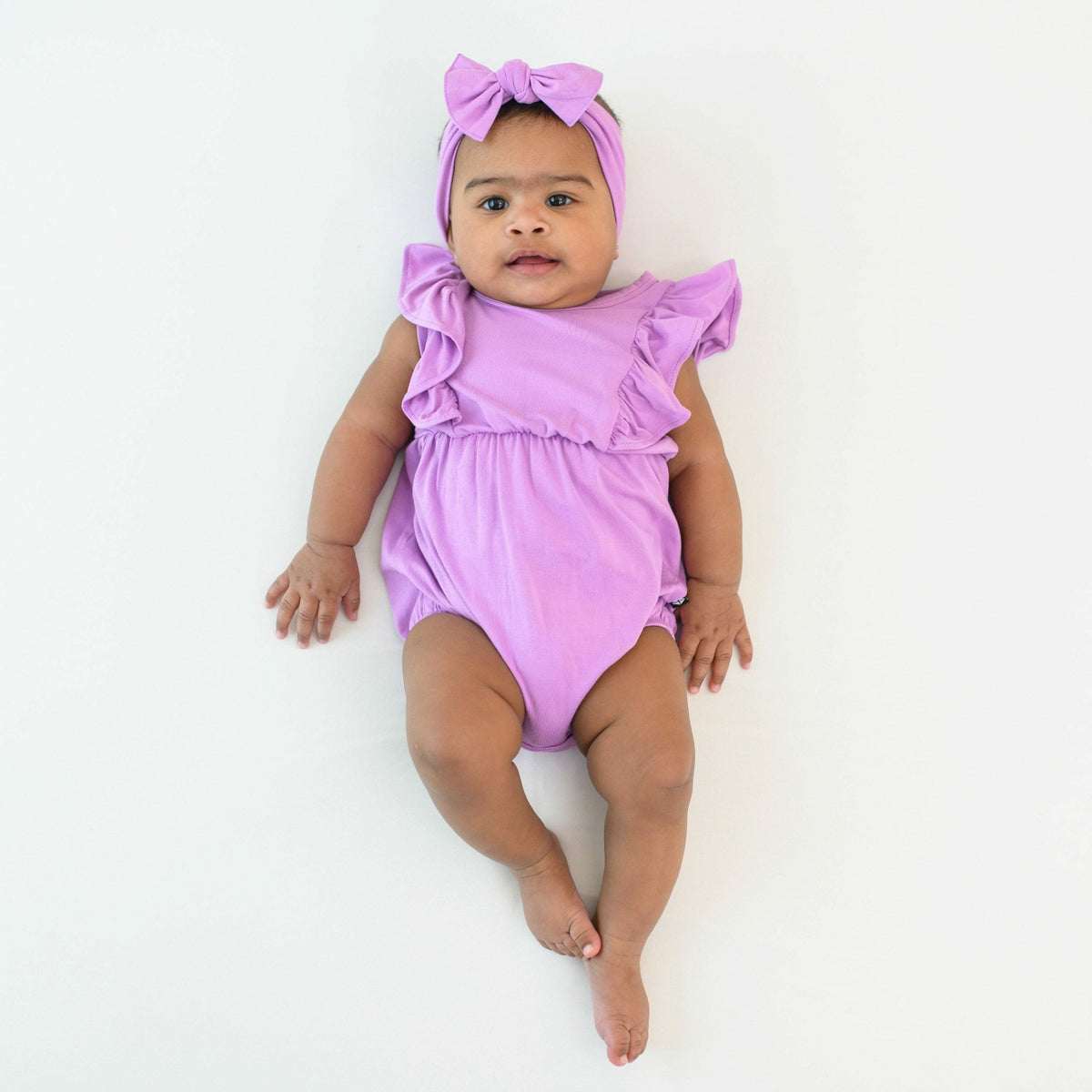 Kyte Baby Bubble Romper in Poi