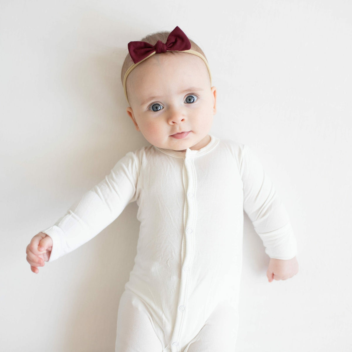 Kyte Baby Tiny Nylon Bow in Burgundy