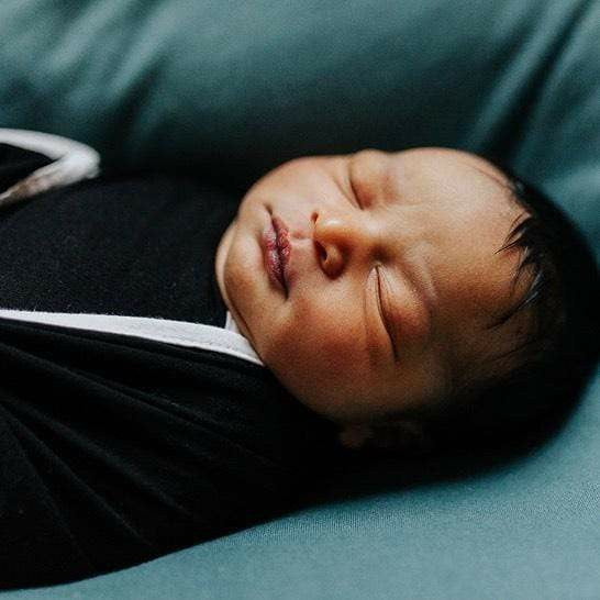 Kyte Baby Swaddle Blanket in Midnight with Cloud Trim