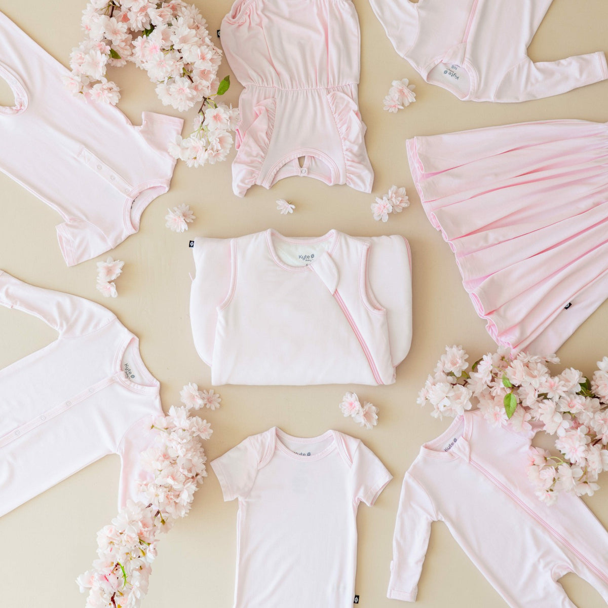 Kyte Baby Bodysuit in Sakura