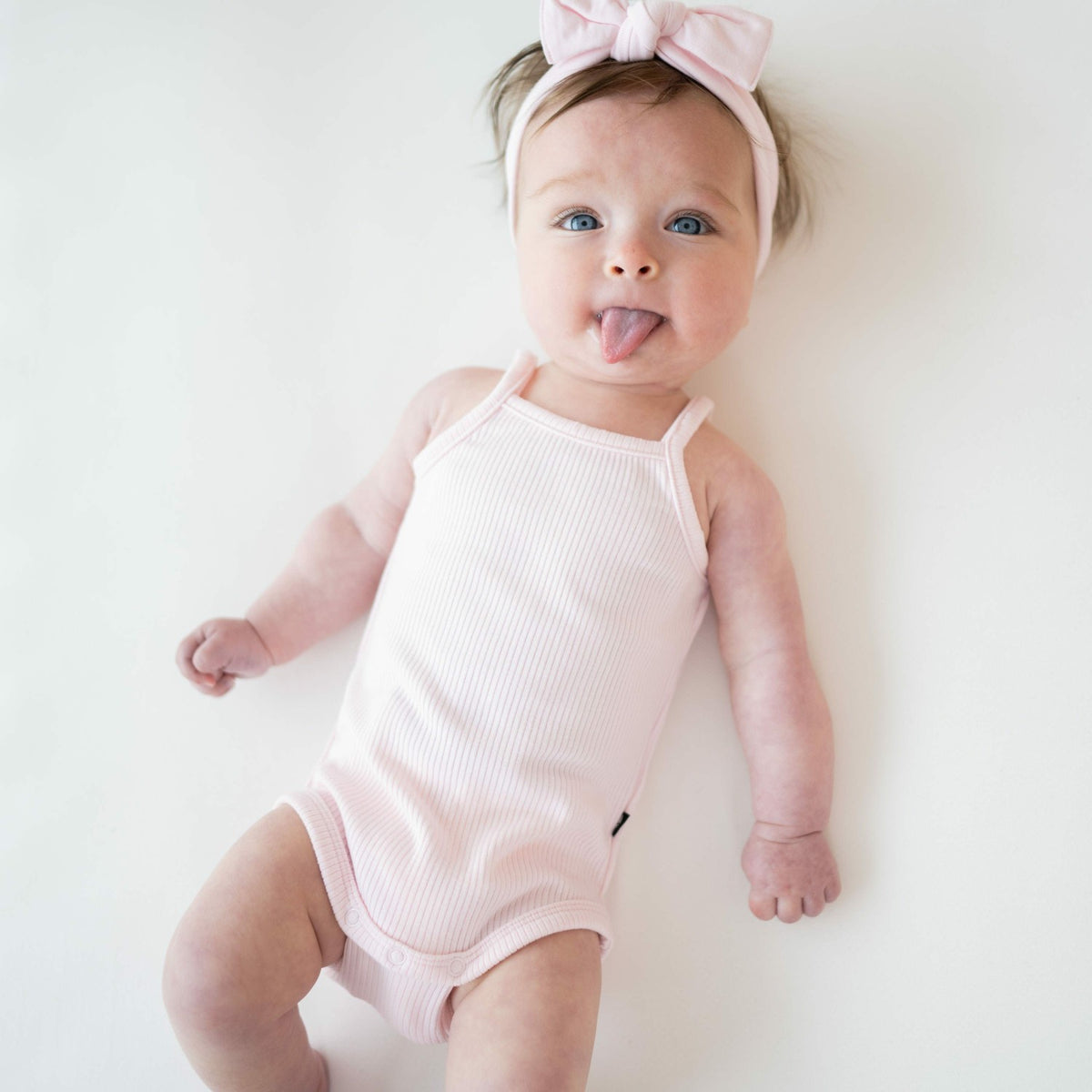 Kyte Baby Ribbed Spaghetti Strap Bodysuit in Sakura