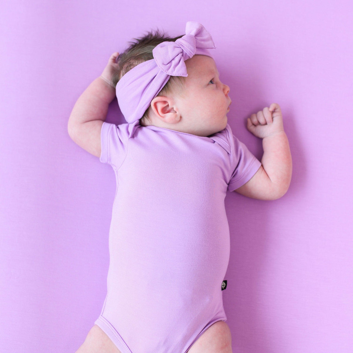 Kyte Baby Bodysuit in Poi