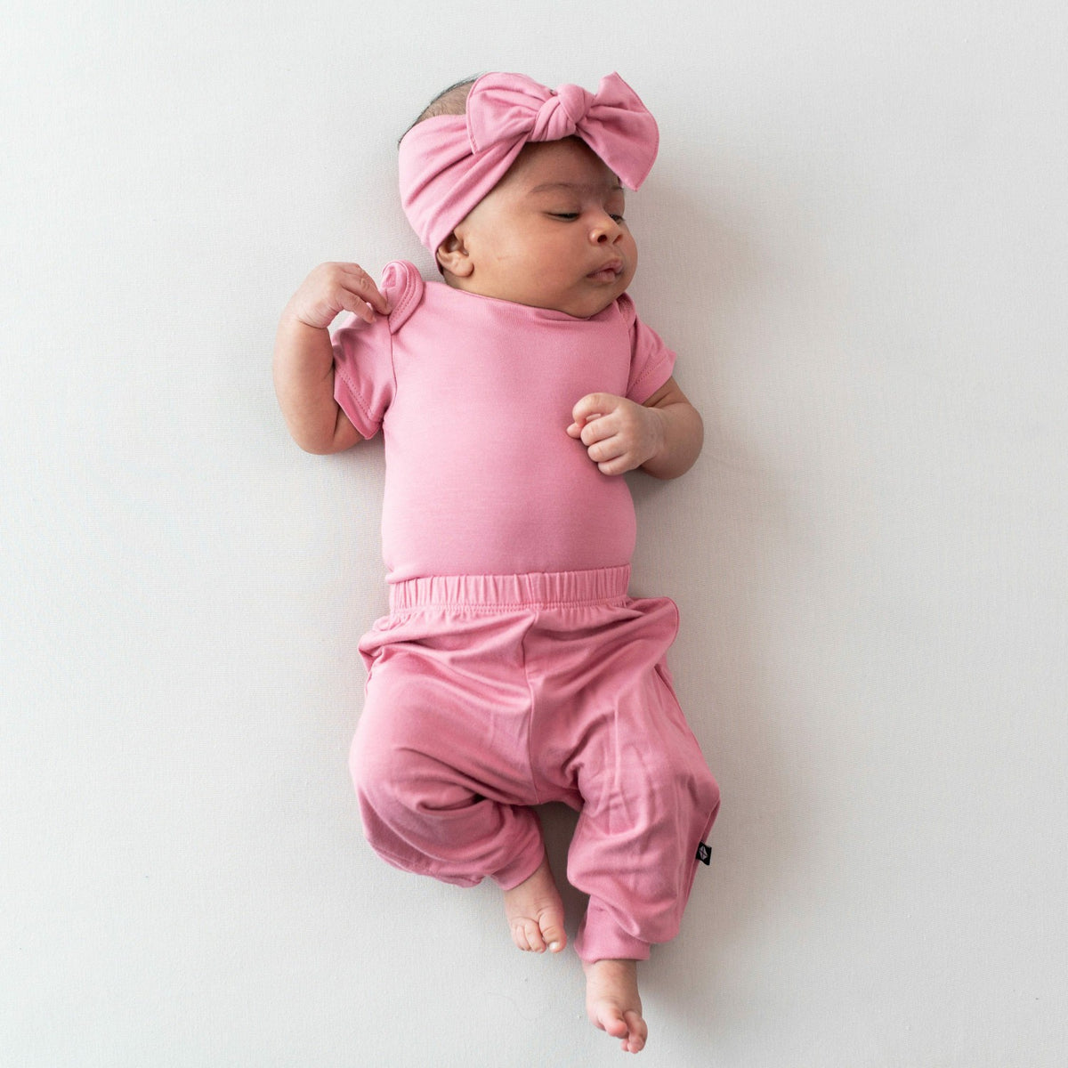 Kyte Baby Bodysuit in Apple Blossom