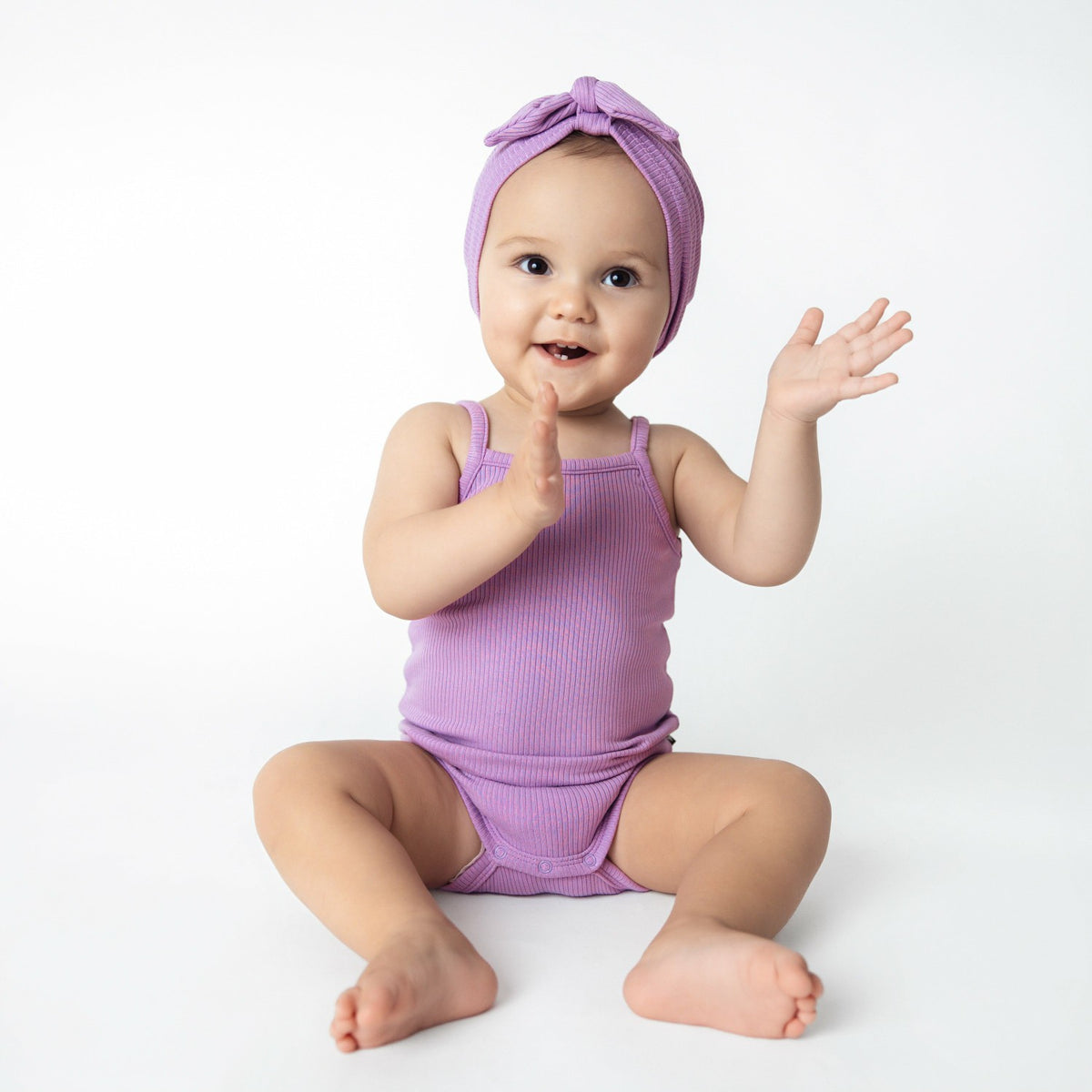 Kyte Baby Ribbed Spaghetti Strap Bodysuit in Poi