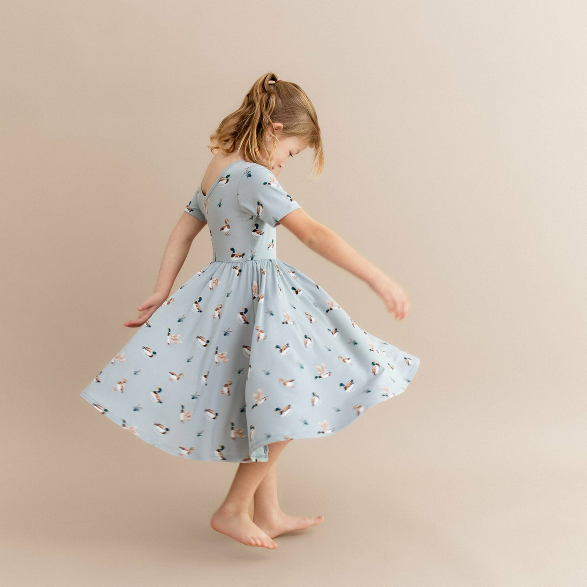 Kyte Baby Twirl Dress in Mallard Duck