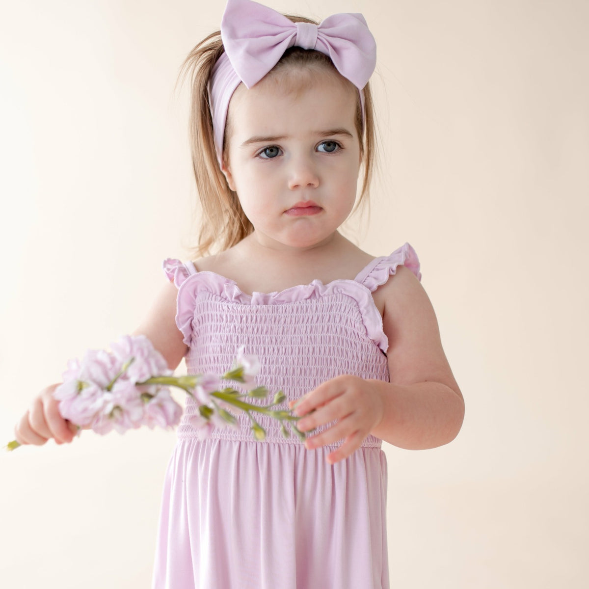 Kyte Baby Smocked Dress in Thistle