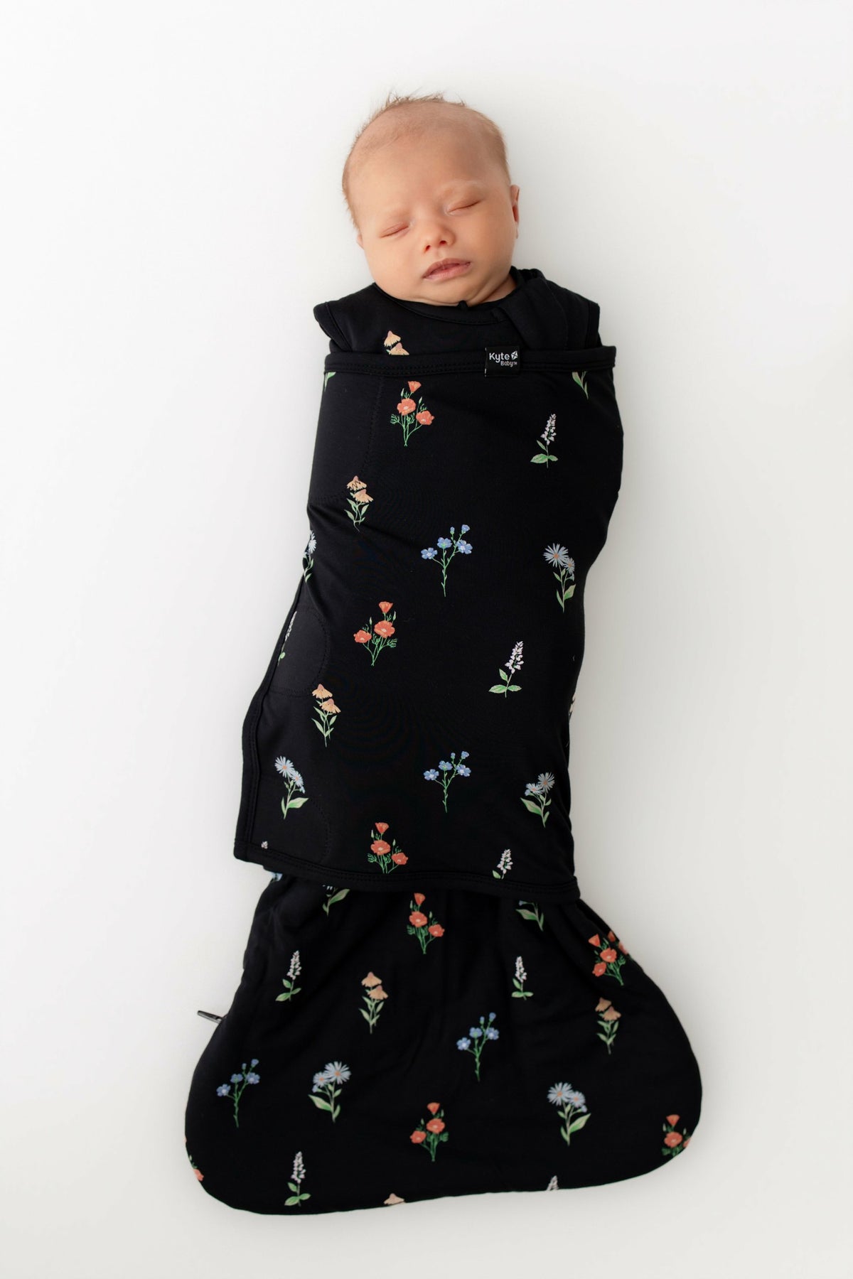 Kyte Baby Sleep Bag Swaddler in Midnight Wildflower 1.0