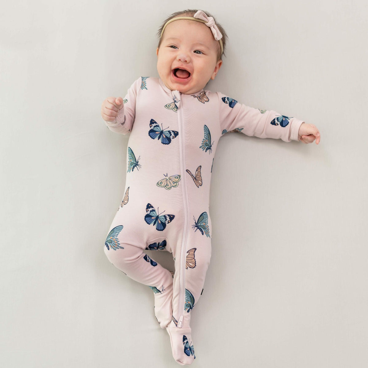 Kyte Baby Zippered Footie in Blush Butterfly