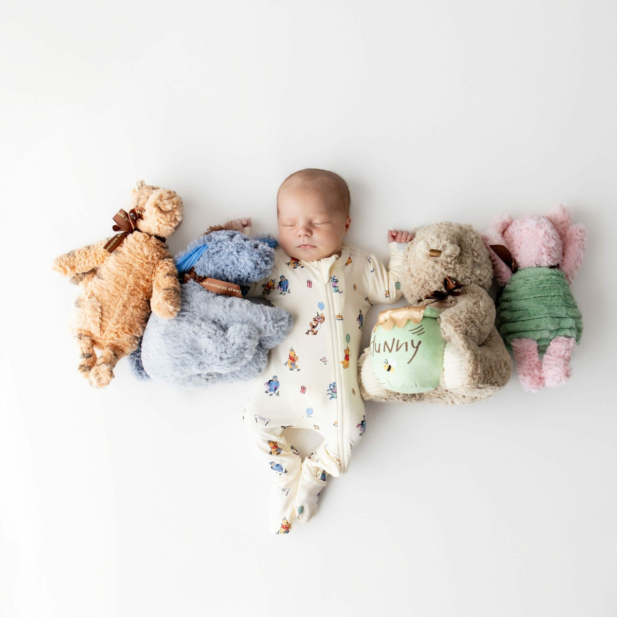 Kyte Baby Zippered Footie in Winnie the Pooh Celebration