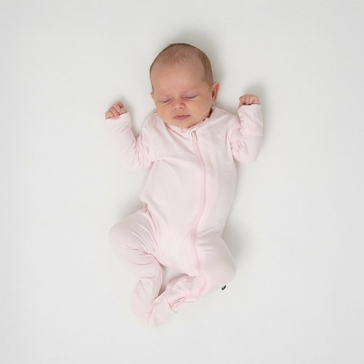 Kyte Baby Zippered Footie in Sakura