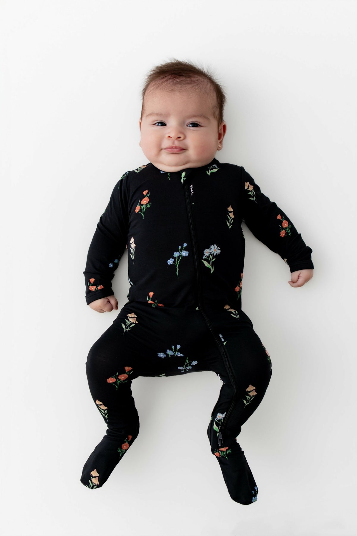 Kyte Baby Zippered Footie in Midnight Wildflower