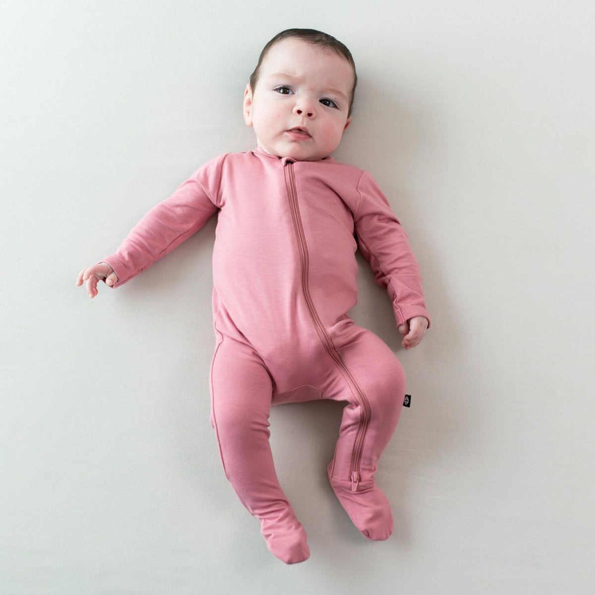 Kyte Baby Zippered Footie in Apple Blossom