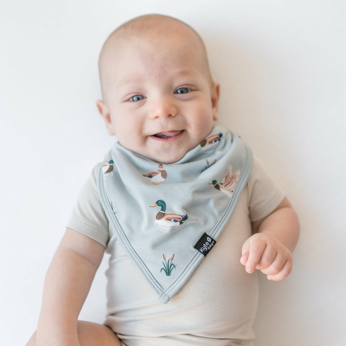 Kyte Baby Bib in Mallard Duck