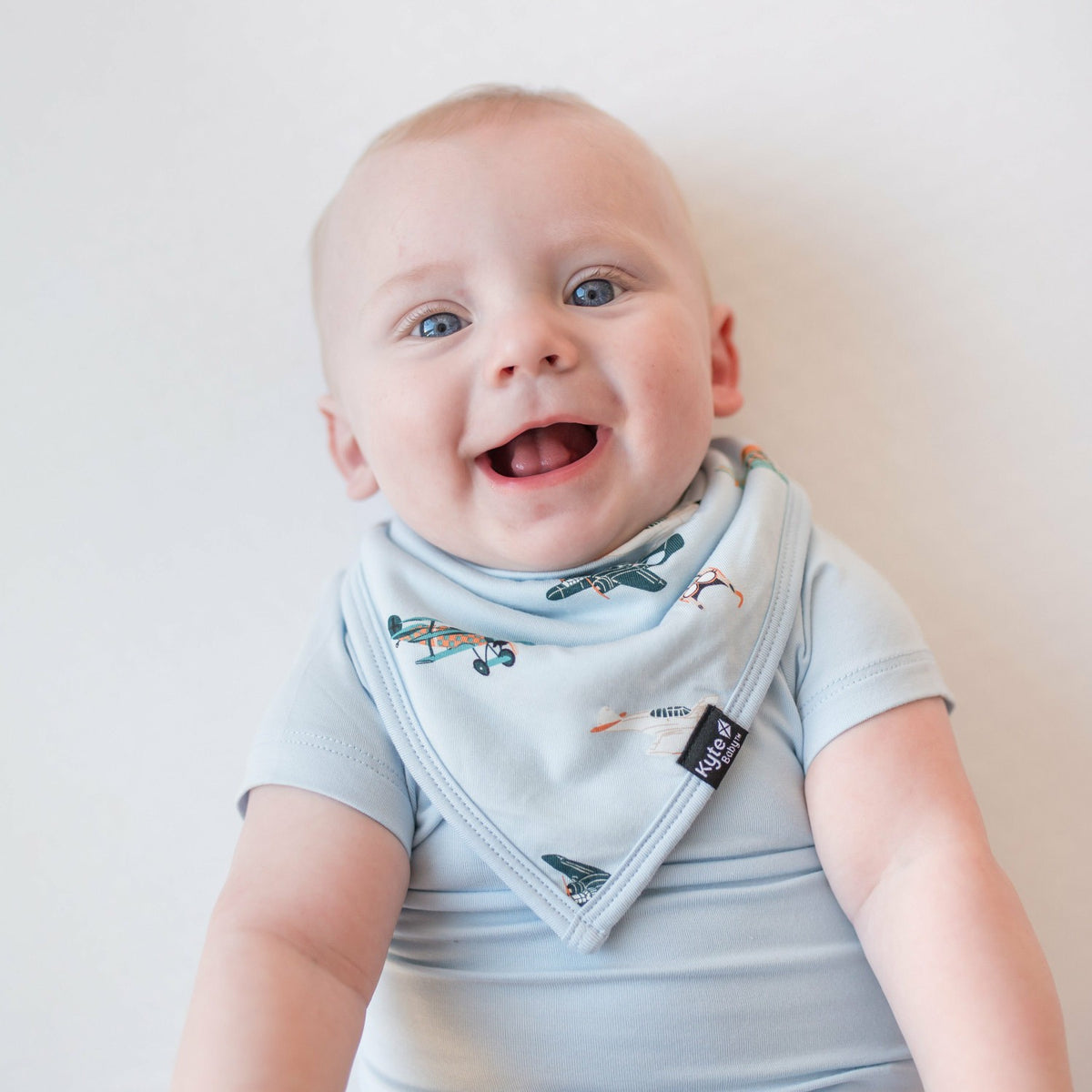 Kyte Baby Bib in Take Off