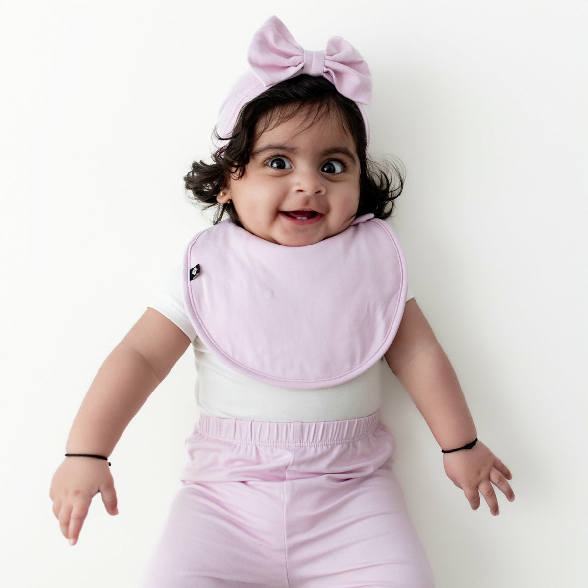 Kyte Baby Cushy Bib in Thistle