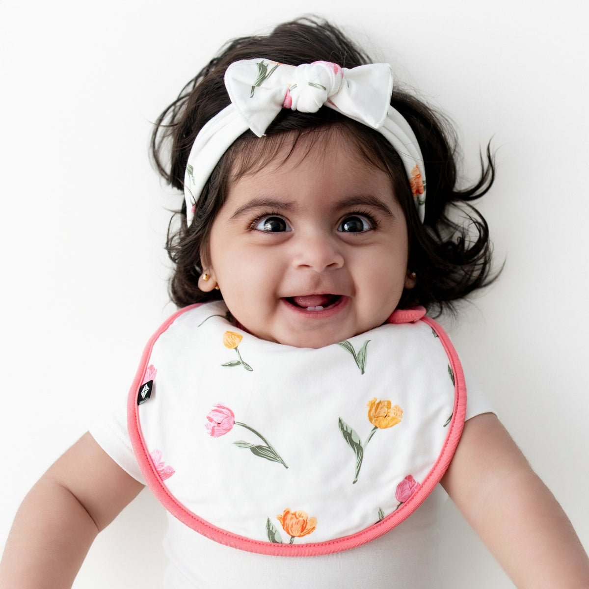 Kyte Baby Cushy Bib in Tulip