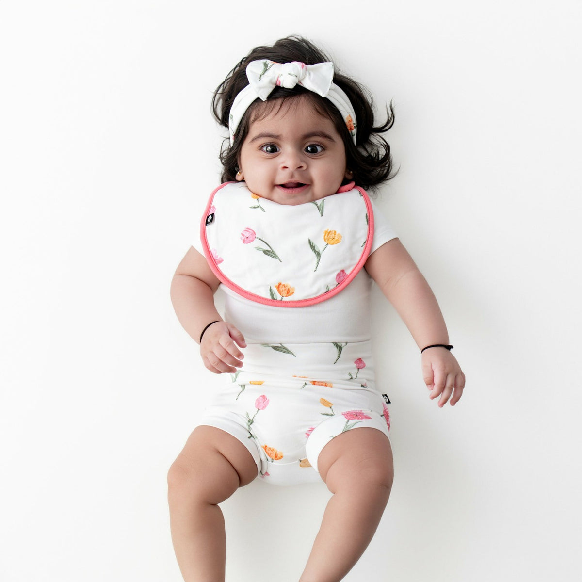 Kyte Baby Cushy Bib in Tulip