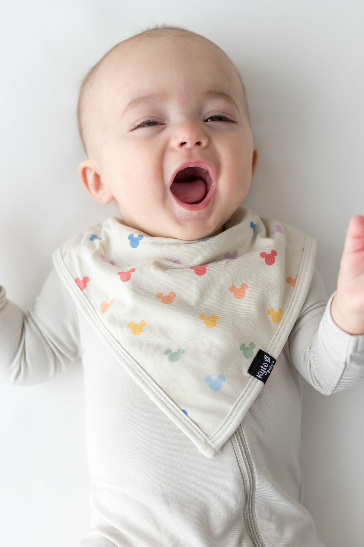Kyte Baby Bib in Pastel Mickey Mouse