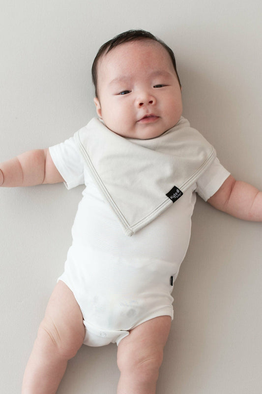 Kyte Baby Baby Bib in Oat