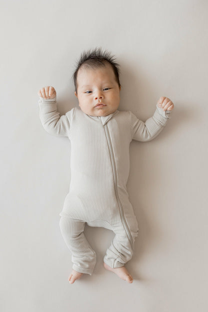 Kyte Baby Ribbed Zipper Romper in Oat