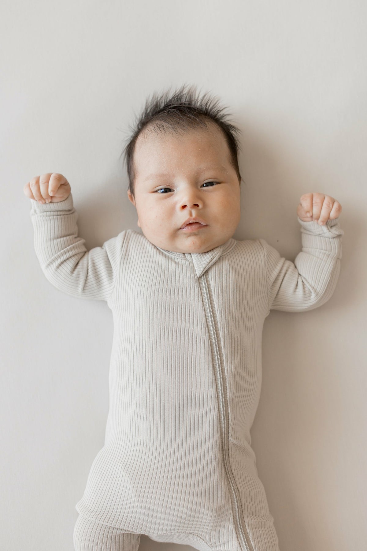 Kyte Baby Ribbed Zipper Romper in Oat