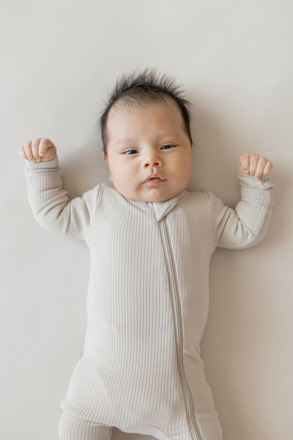 Kyte Baby Ribbed Zipper Romper in Oat