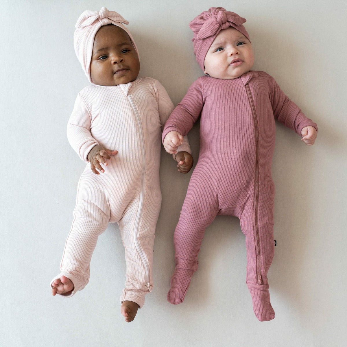 Kyte Baby Ribbed Zipper Romper in Blush