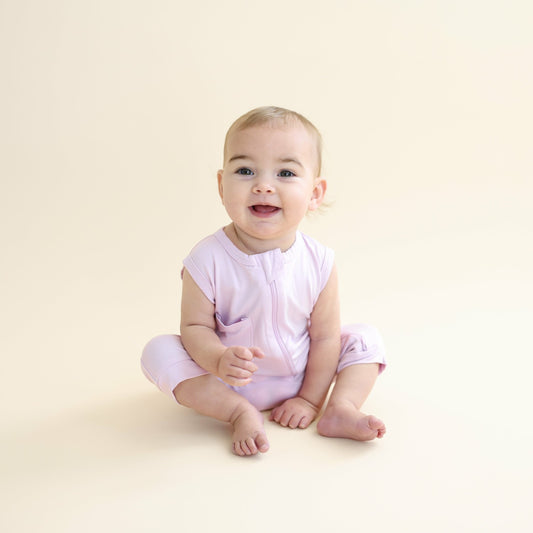 Kyte Baby Zippered Sleeveless Romper in Thistle