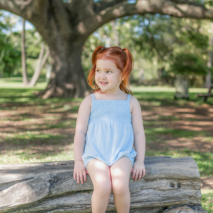 Kyte Baby Smocked Bubble Romper in Breeze