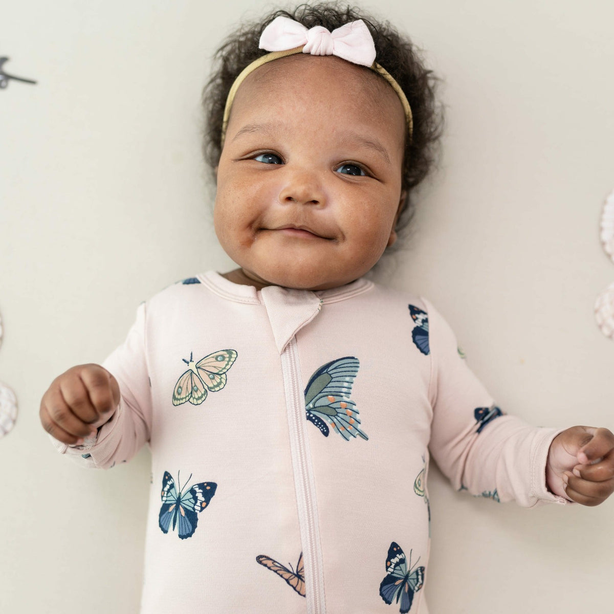 Kyte Baby Zippered Romper in Blush Butterfly