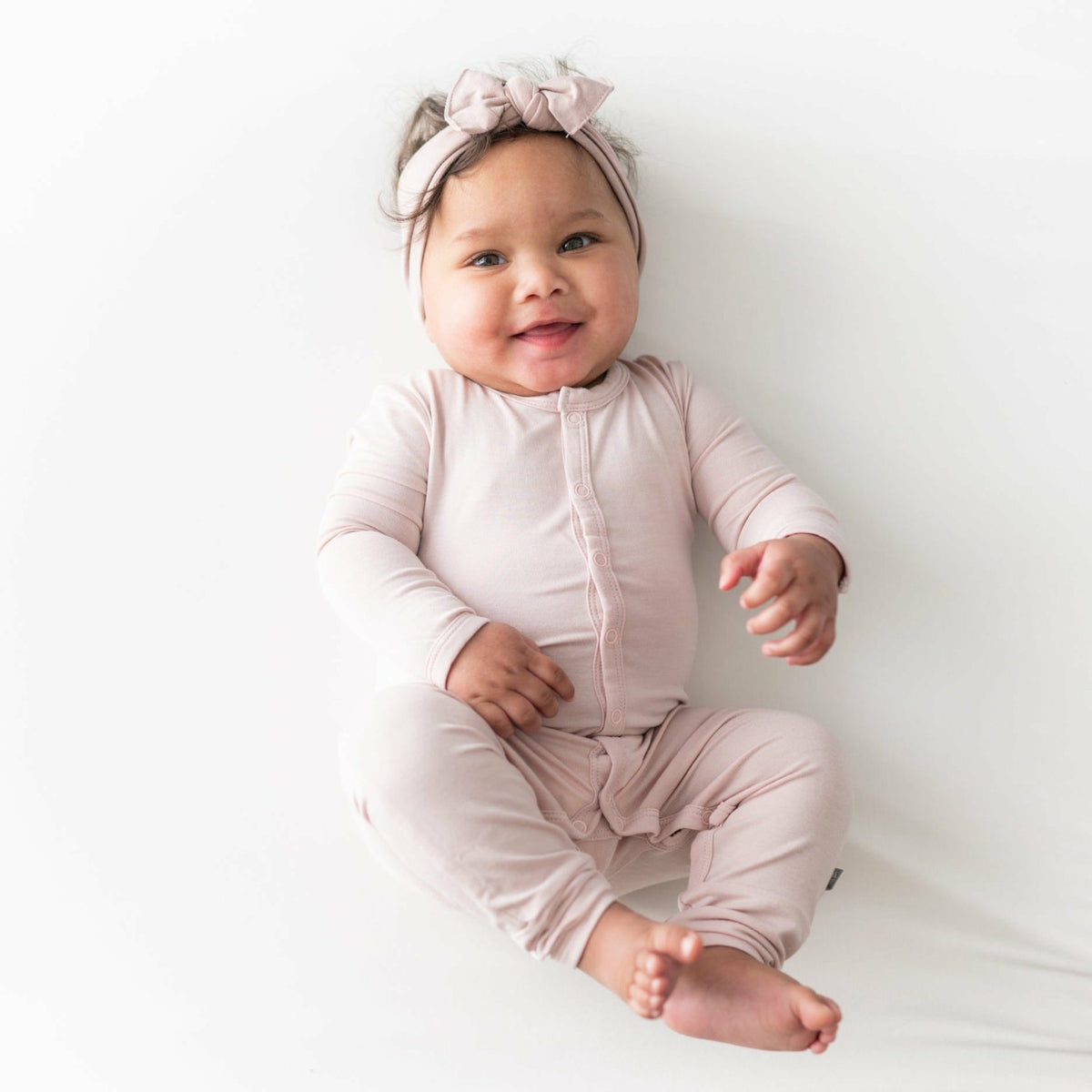 Kyte Baby Snap Romper in Blush