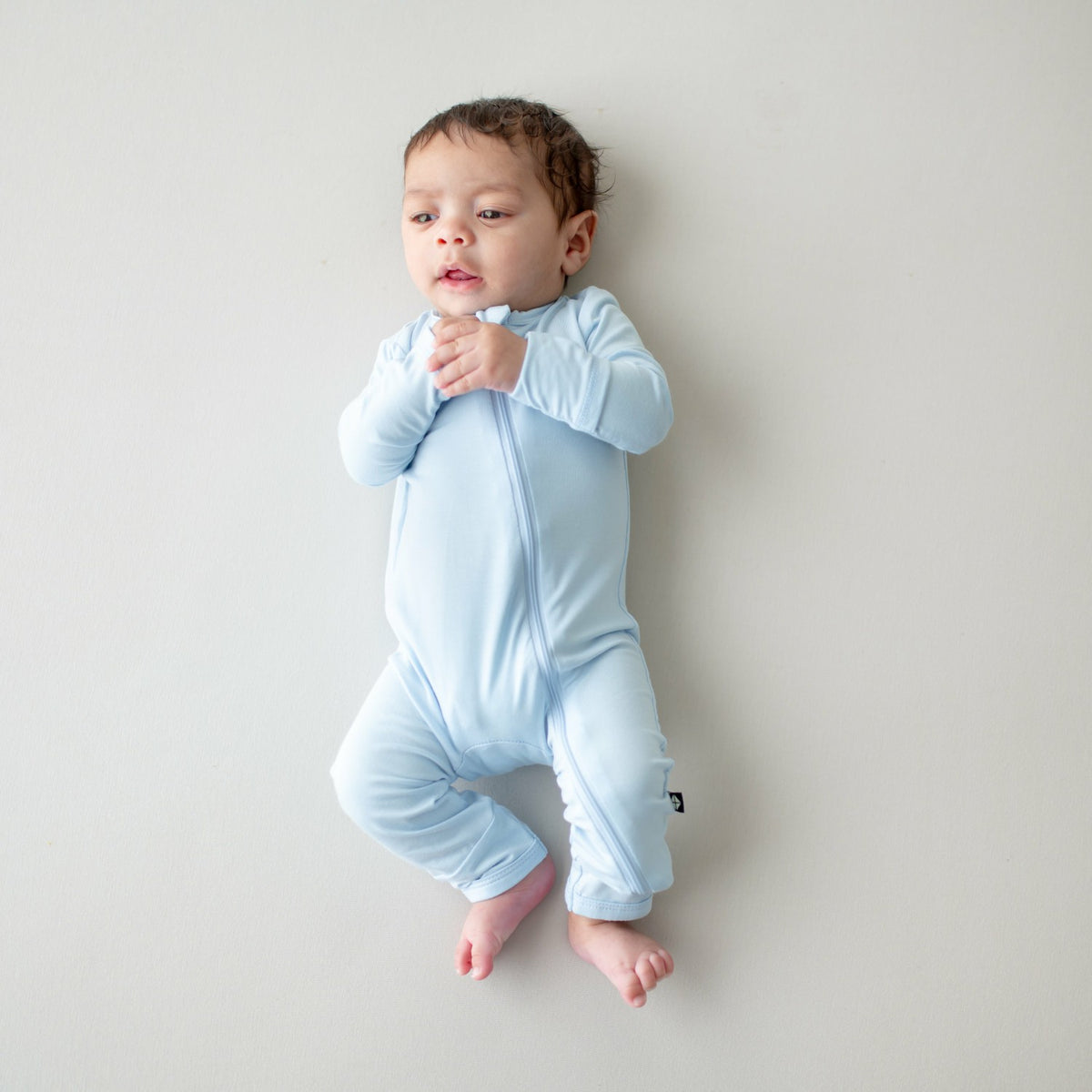 Kyte Baby Zippered Romper in Breeze