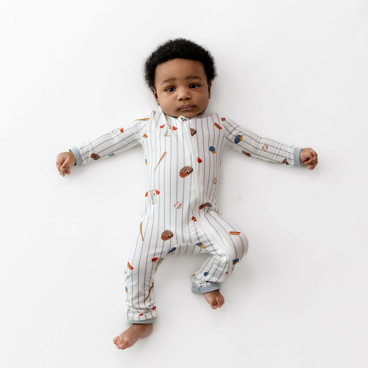 Kyte Baby Zippered Romper in Home Run