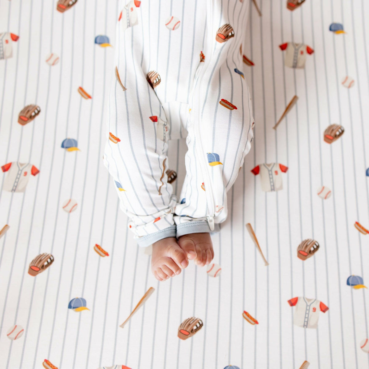 Kyte Baby Zippered Romper in Home Run