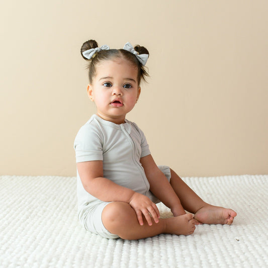 Kyte Baby Zippered Shortall Romper Oat