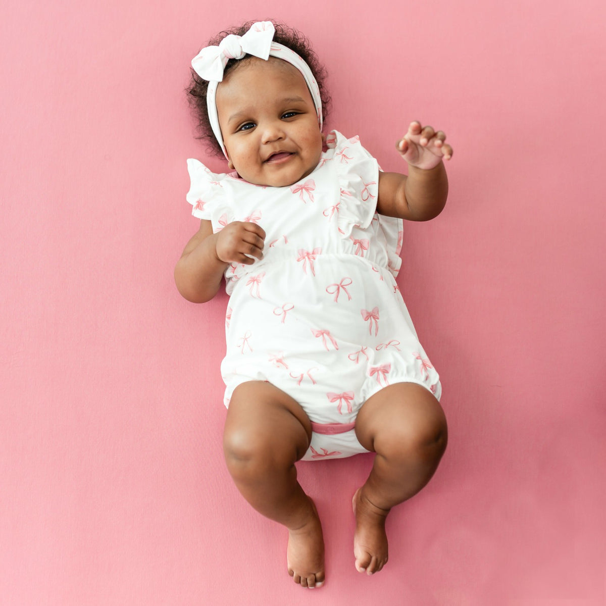 Kyte Baby Bubble Romper in Bow