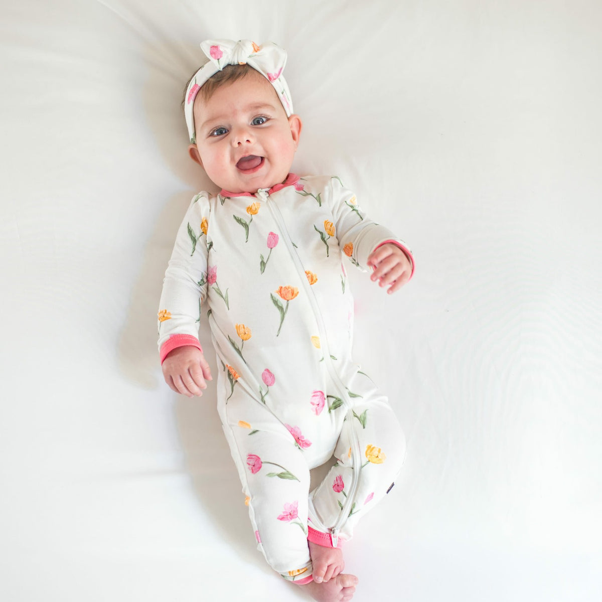 Kyte Baby Zippered Romper in Tulip