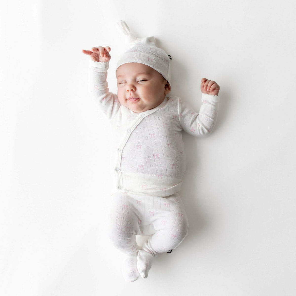 Kyte Baby Pointelle Take Me Home Set with Cap in Sweet Pink Bow