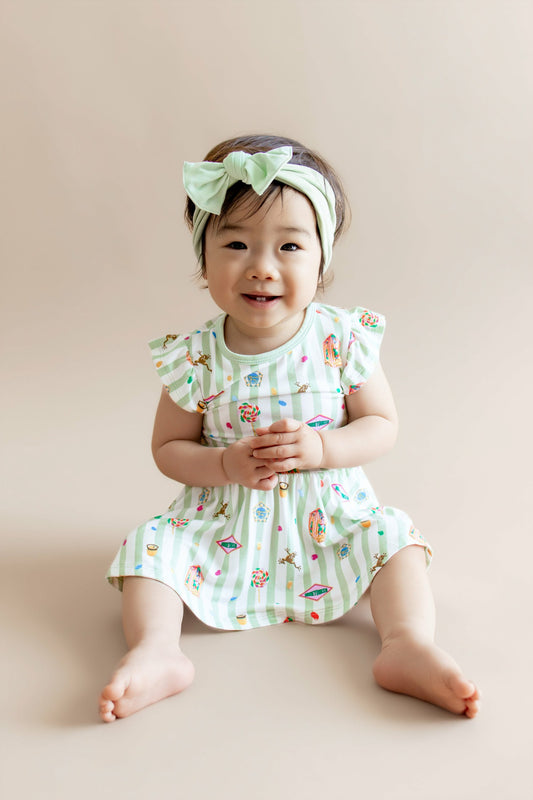 Kyte Baby Twirl Bodysuit Dress in Honeydukes