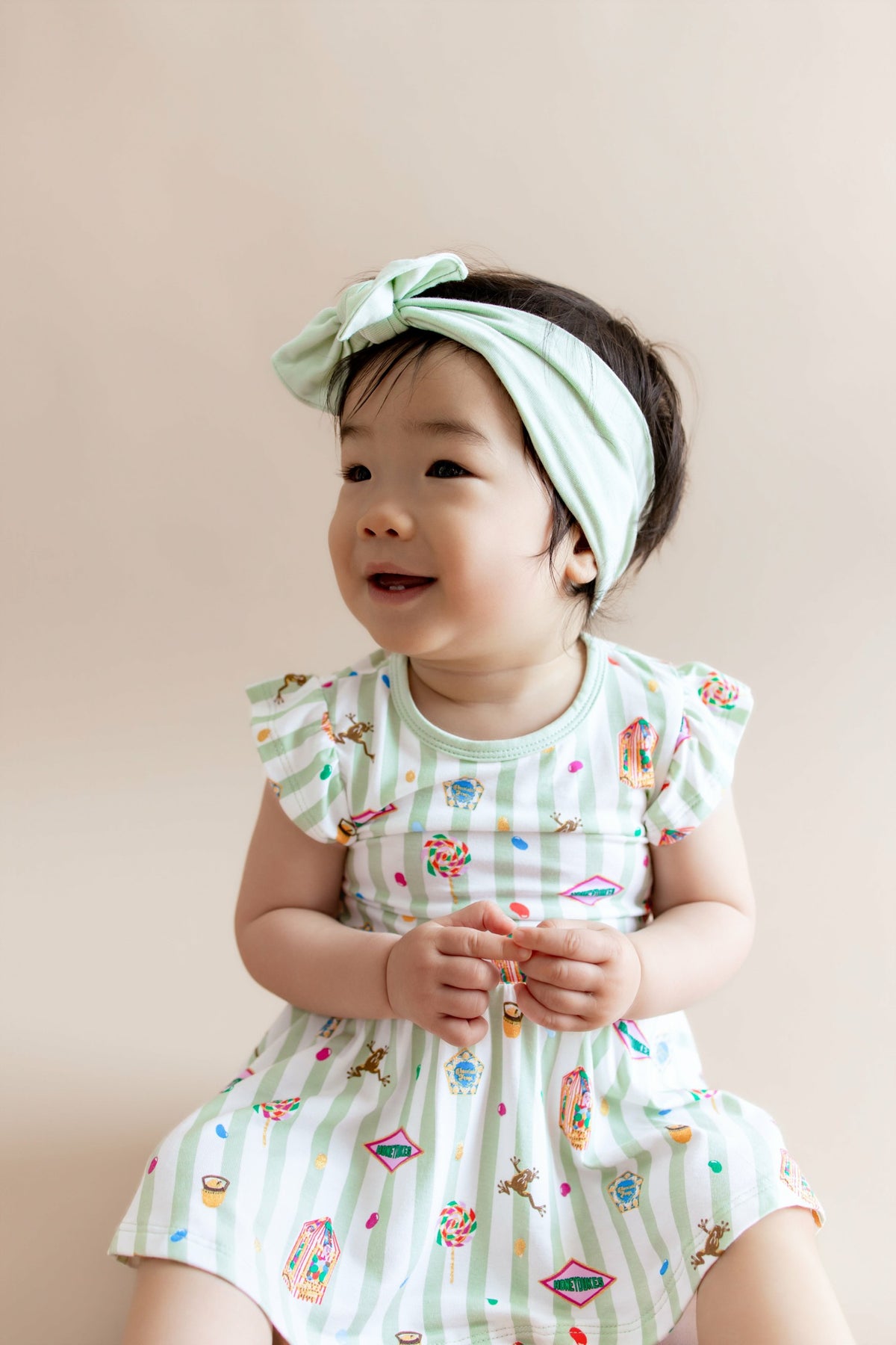 Kyte Baby Twirl Bodysuit Dress in Honeydukes