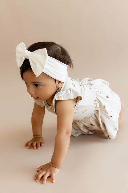 Kyte Baby Twirl Bodysuit Dress in Starry Icon