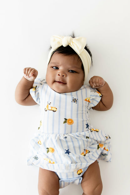 Kyte Baby Twirl Bodysuit Dress in Amalfi Coast